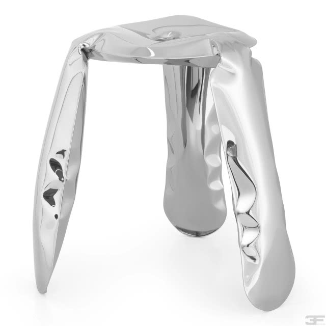 stołek srebrny nadmuchany i zdeformowany