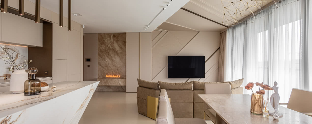 Jak zaprojektować kuchnię z wyspą, by była częścią eleganckiego salonu?