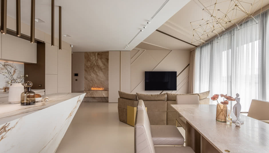 Jak zaprojektować kuchnię z wyspą, by była częścią eleganckiego salonu?