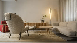 Minimalizm we współczesnym wydaniu. Dwupoziomowe mieszkanie w Warszawie