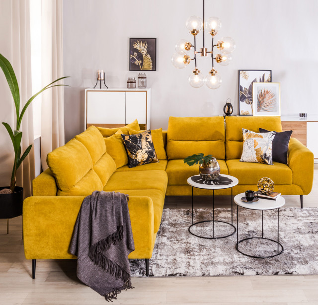 prostotę pomieszczeń w jasnych kolorach, przełamaną nowoczesnymi rozwiązaniami