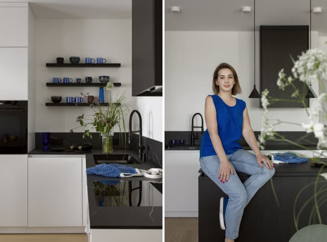 Czarno-biała kuchnia z wyspą i niebieskimi dodatkami