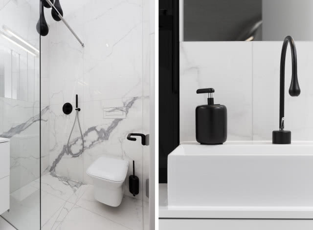 Łazienka z marmurem i ciemnymi dodatkami