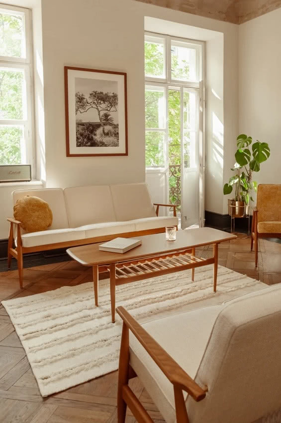 stolik w salonie, kanapa i fotele