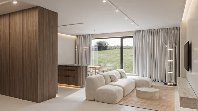 wyspa kuchenna, oświetlenie punktowe, kanapa, dywan, telewizor, zasłony, stolik kawowy