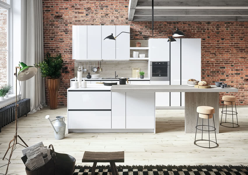 Biała zabudowa kuchenna o gładkich frontach...