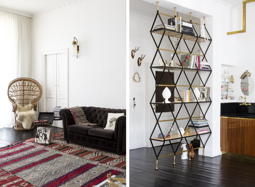 Czarna sofa w stylu chesterfiled pięknie odcina...