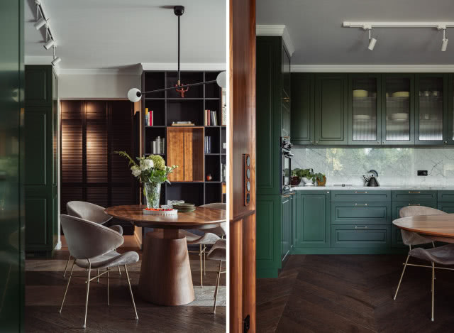 Zielona kuchnia z drewnianym stołem i podłogą
