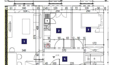 Podłużny salon z aneksem