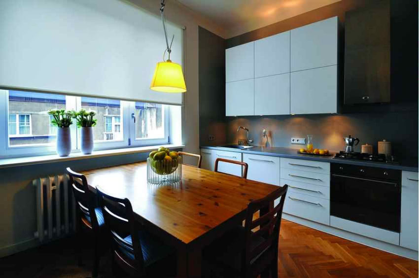 Nowoczesna zabudowa kuchenna utrzymana jest w...