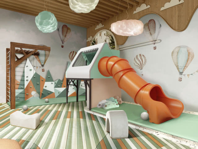zjeżdżalnia, huśtawka, drabinka i ścianka wspinaczkowa w pokoju dziecięcym