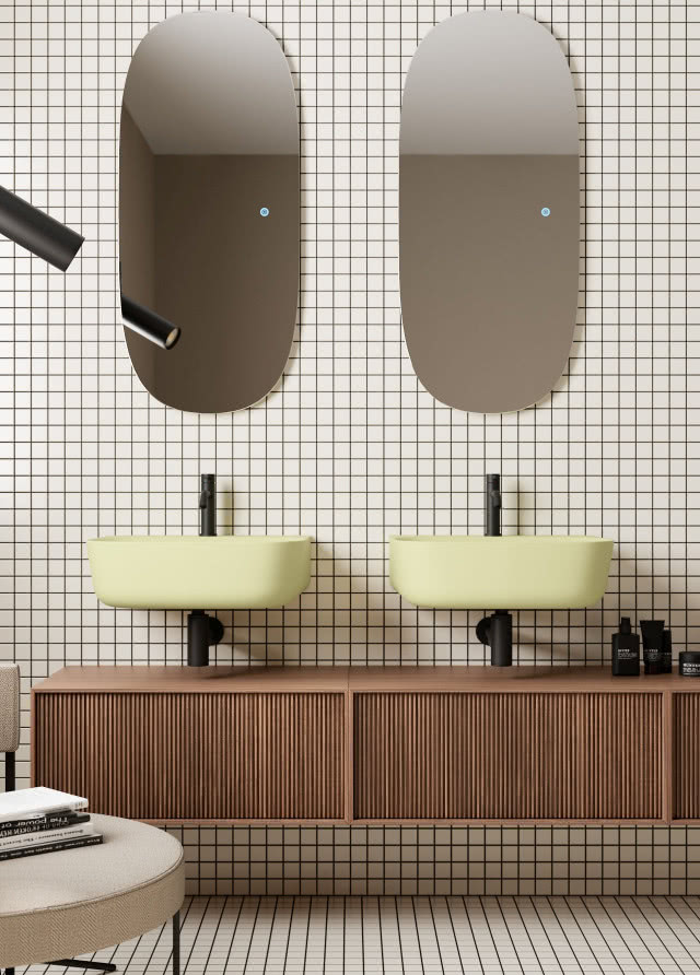 dwie żółte umywalki na drewnianej  szafce