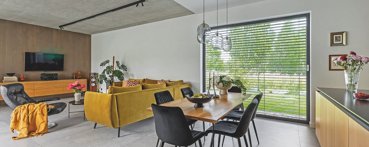 Spełnione marzenia. Geometryczna bryła domu i przytulny minimalizm we wnętrzach