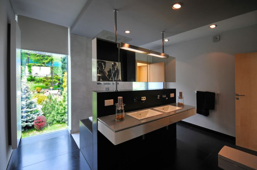 Nowoczesna łazienka w czerni, bieli i szarości.