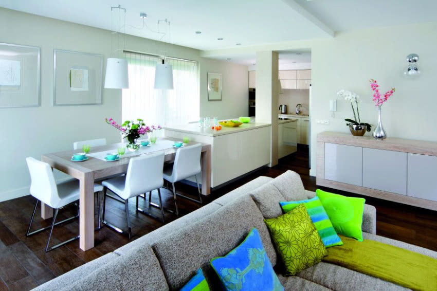 Na kanapie poduszki z Almi Décor. Zielona...