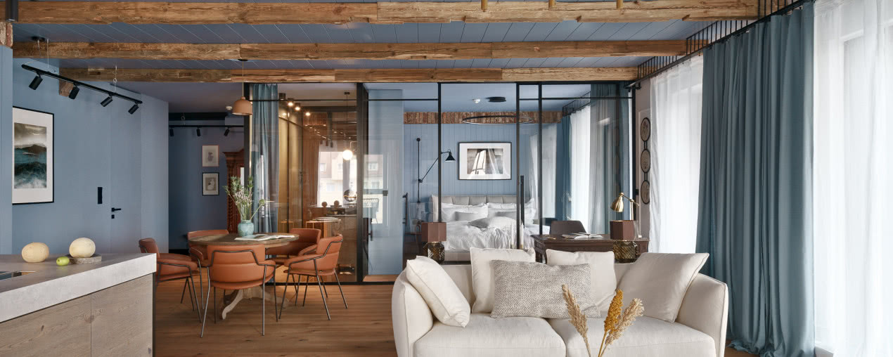 Designerski apartament na Wyspie Spirzchów - ma niebieski sufit i szklaną ścianę!