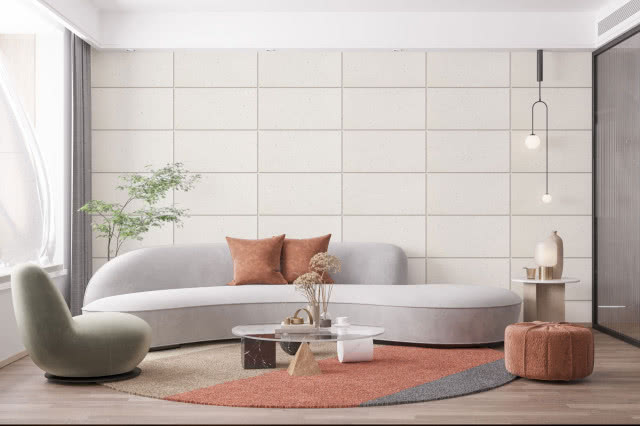 panele kwarcowe w kolorze białego wina, fotel, kanapa, puf, dywan, stolik, poduszki ozdobne, lampka na stoliku, lampa wisząca