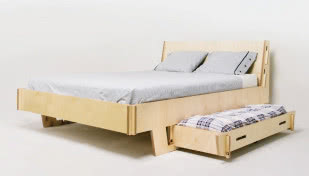 Śpioch - łóżko z praktyczną szufladą na pościel.