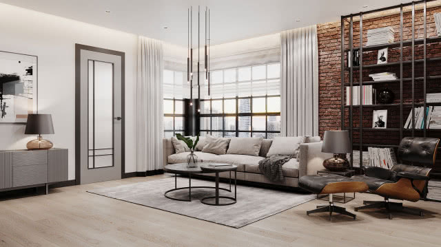 szare drzwi z przeszkleniami, dywan, kanapa, komoda, cegła na ścianie, stolik kawowy, fotel, metalowy regał