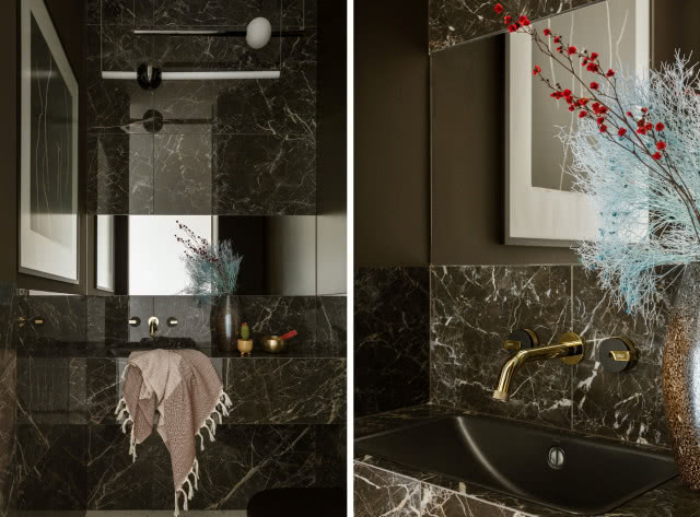 ciemna łazienka z kamieniem na ścianie