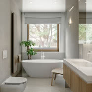 Minimalistyczny dom na Kaszubach. Ma wysoki sufit nad salonem i antresolę!