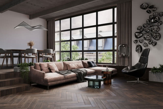 drewniana podłoga ułożona w jodełkę, kanapa, duże okno, fotel, duży stół z krzesłami
