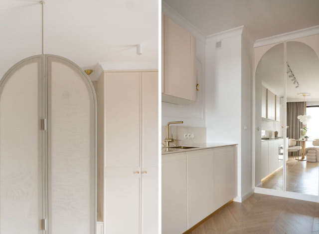 beżowa kuchnia z zaokrąglonymi szafkami