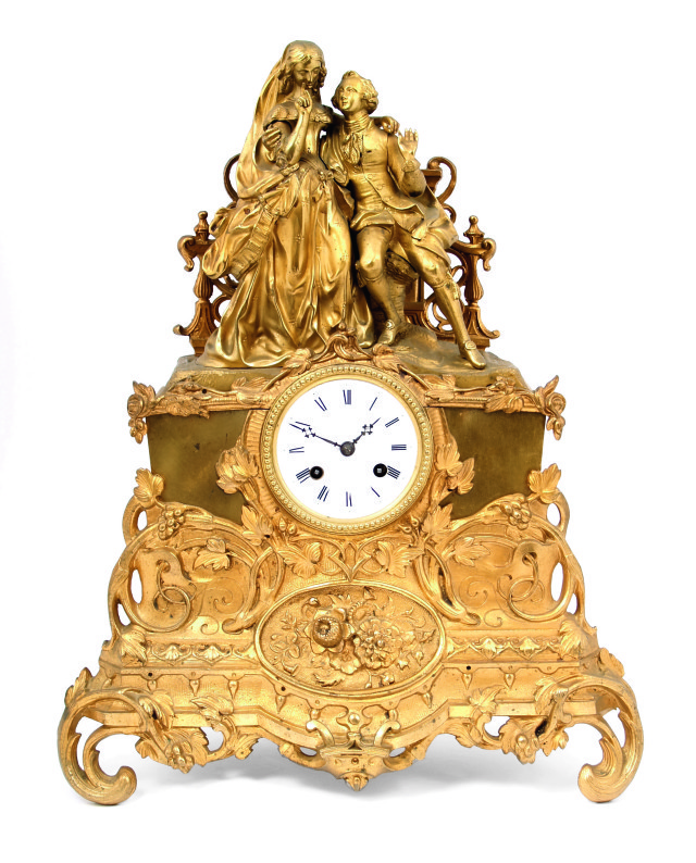 Zegar kominkowy, Francja, II poł. XIX w., brąz złocony, cyzelowany,
wys. 46 cm, Antyki d’Raculi, cena 3200 zł